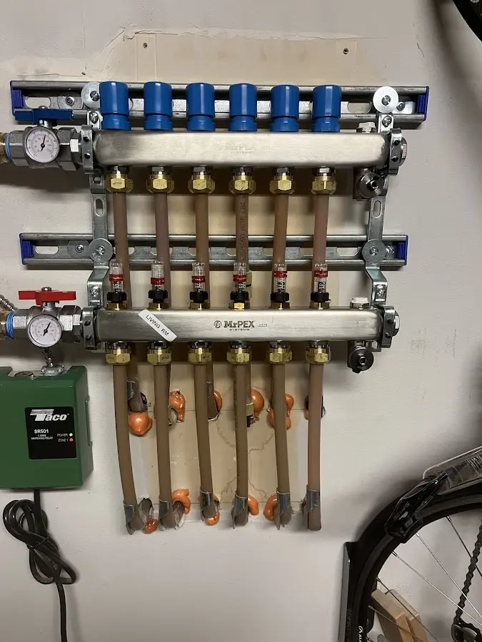 Plumber performing Leak Detection at a residential property in Torrington